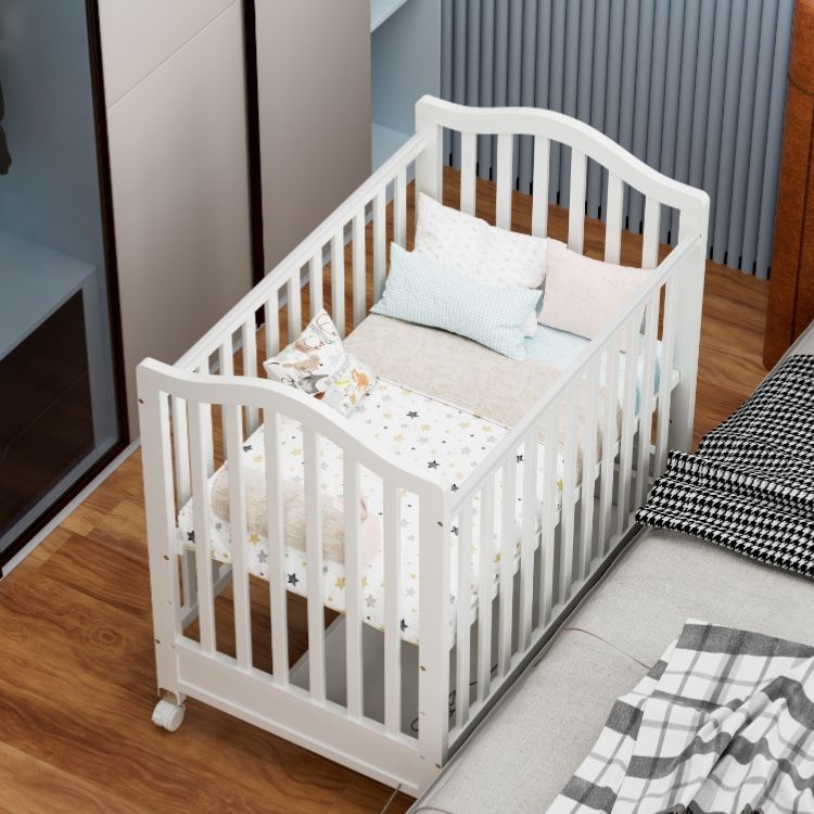 מיטה לתינוקות עם מגירת אחסון – קומפקטית צבע לבן