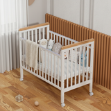 מיניגו – מיטת תינוק מעץ מלא, לבן עם שילוב עץ | מיטת תינוק