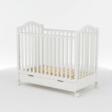 מיטה לתינוקות עם מגירת אחסון – קומפקטית צבע לבן